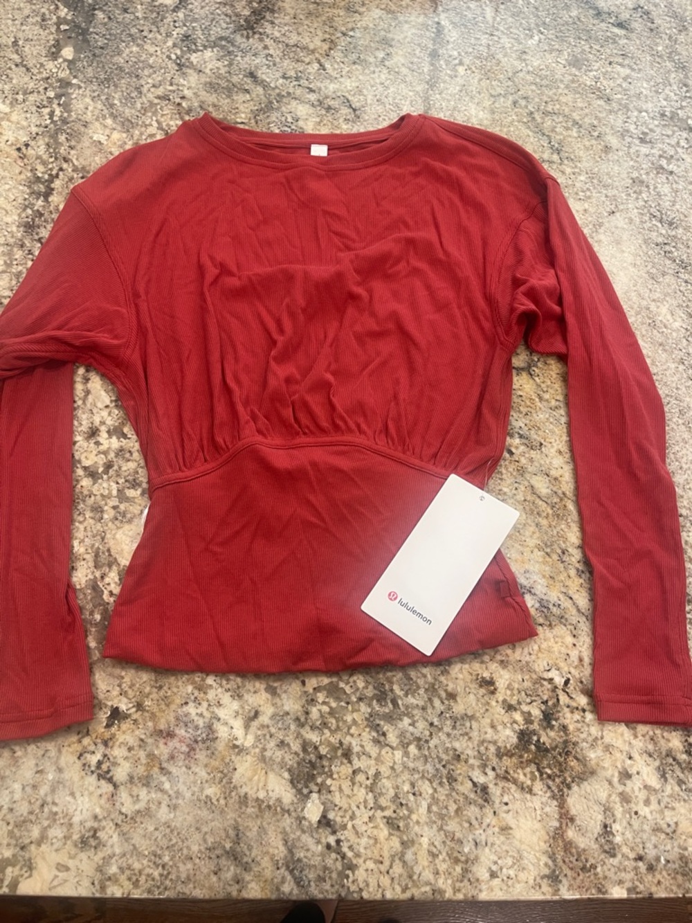 lululemon athletica Women's Long Sleeve Ribbed Crew in color rust